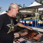 Cooking up the sausage at the Lemoore Lions Brewfest.